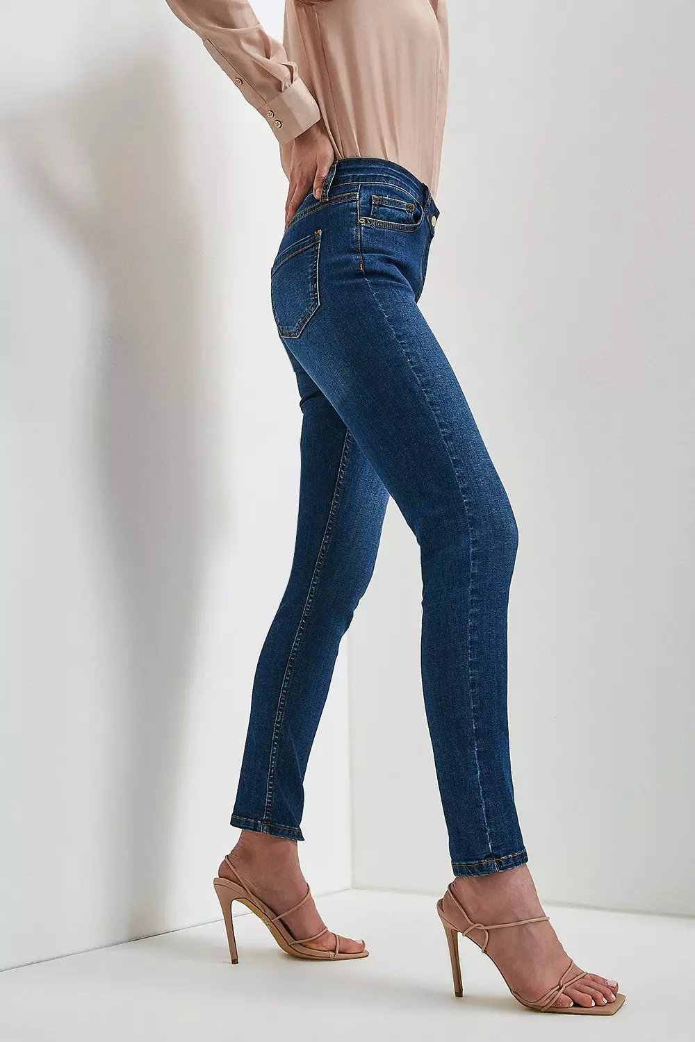 Mid rise best sale skinny jeans meaning